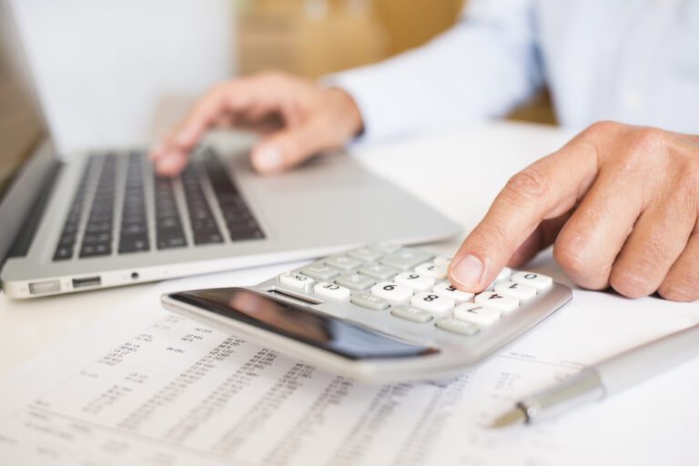 Calculator and laptop.