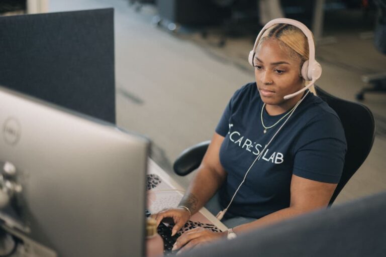 A licensed insurance agent working at her computer.